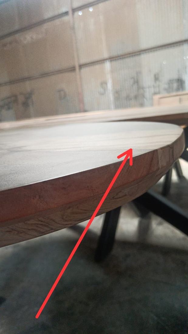 Joint line showing at the edge of a round dining table top