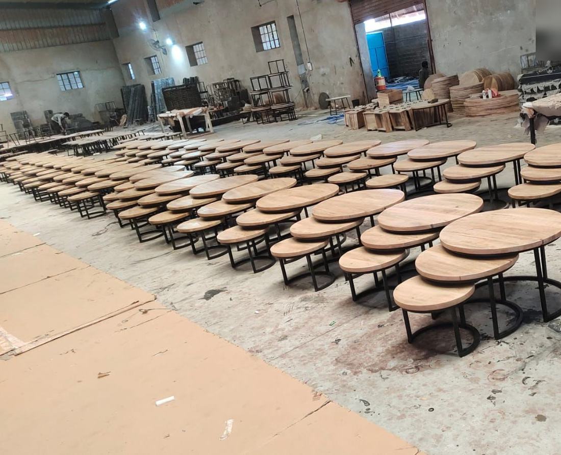 Nesting table sets laid out for checking
