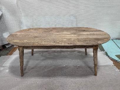 Solid wood dining table at inspection