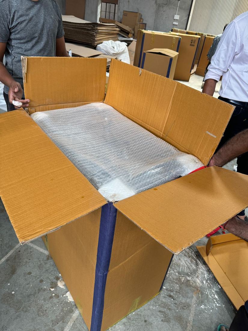 Packed carton opened at random to check the wrapping inside