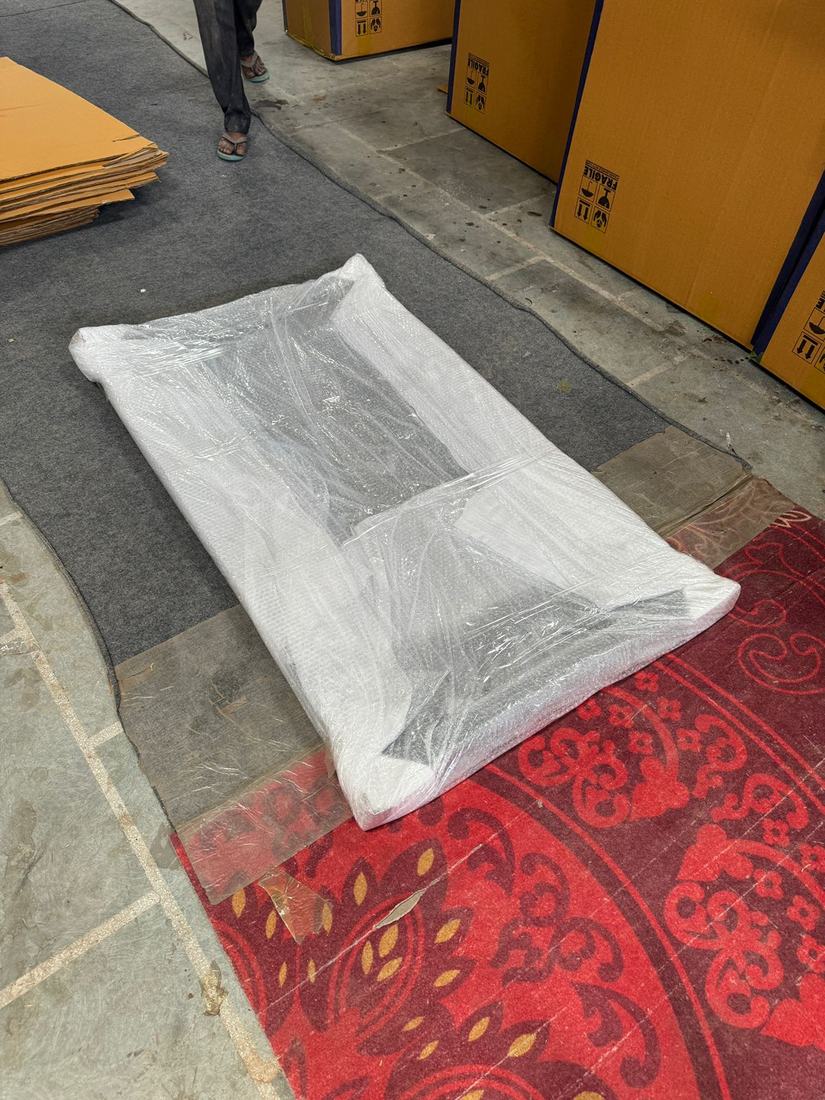 Top fully wrapped in foam and bubble wrap