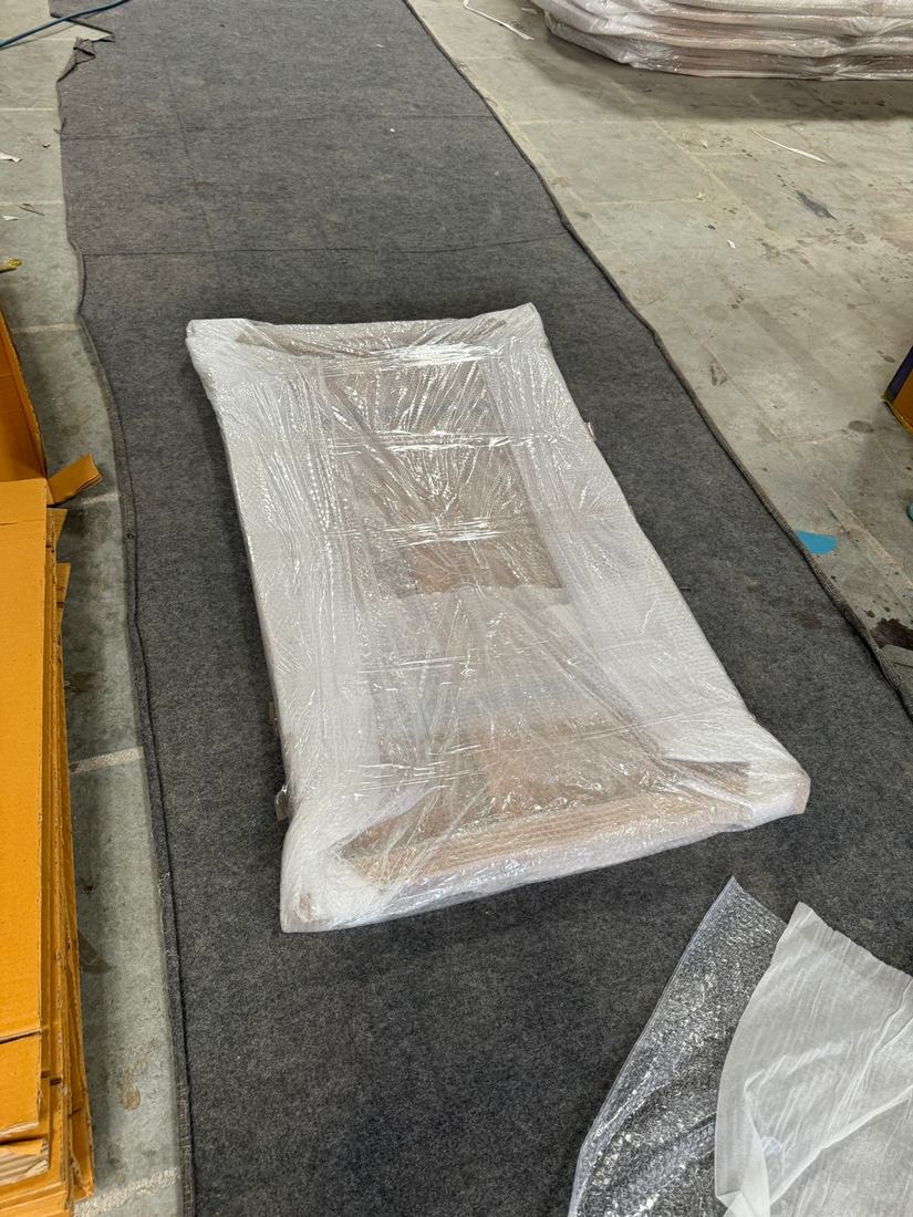 Wrapped table top ready for its carton